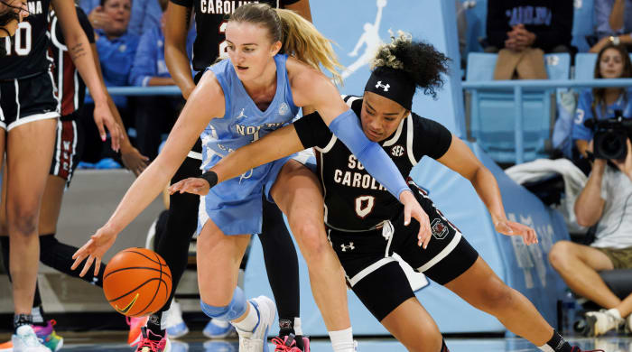 South Carolina’s Te-Hina Paopao attempts to steal the ball from North Carolina’s Alyssa Ustby.
